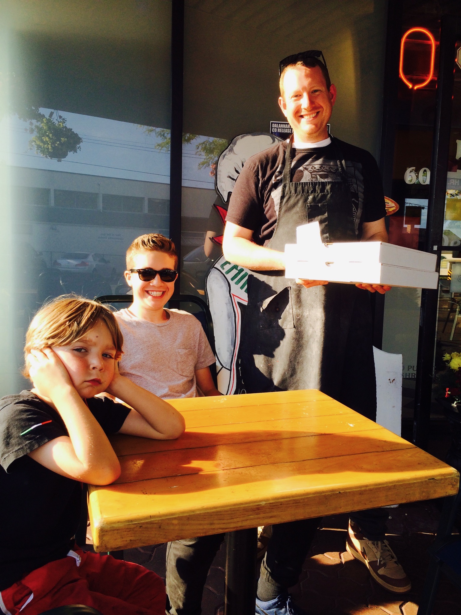 Aaron posing with his nephews at Emilio Finatti White Rock.