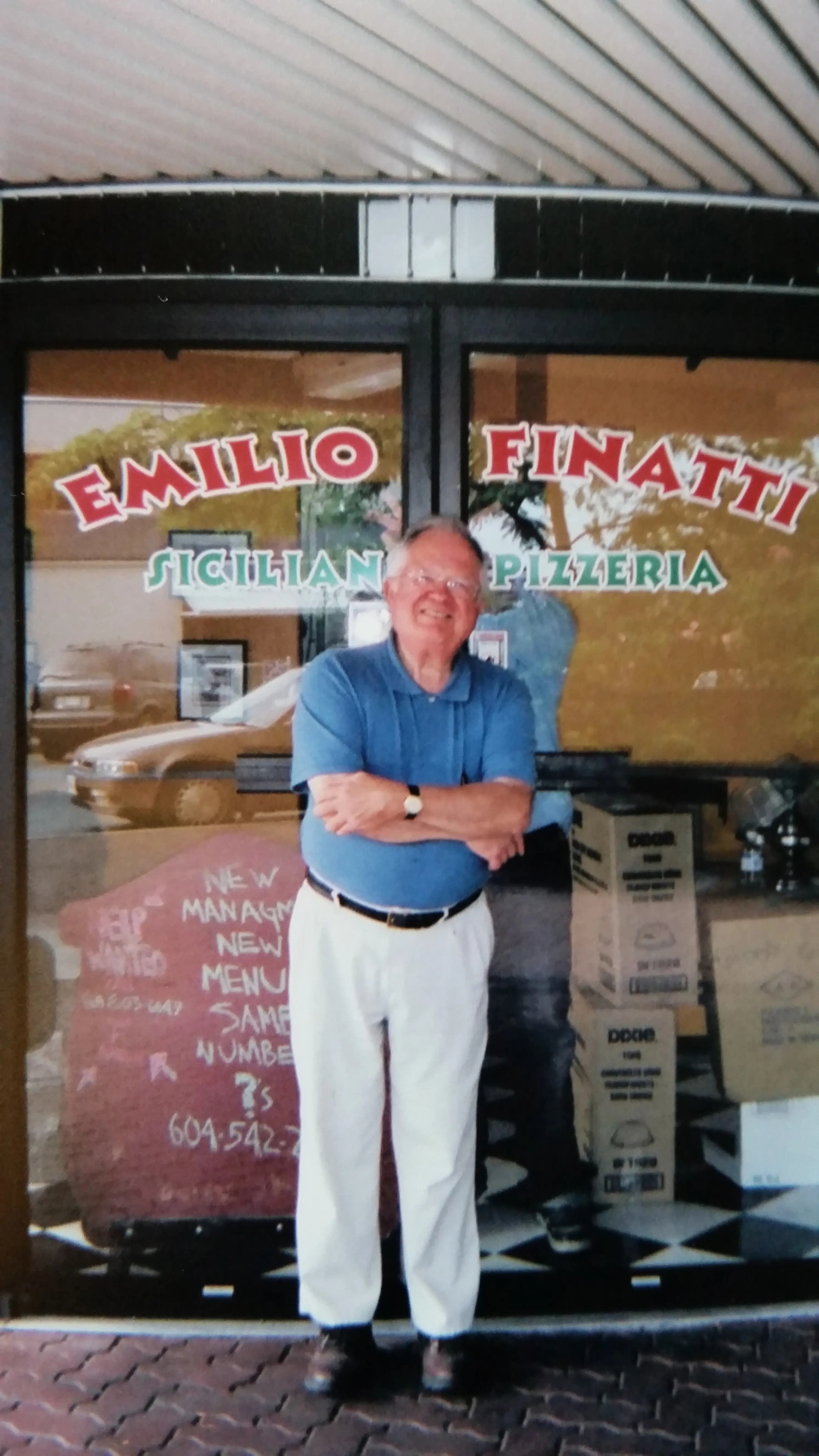 Aaron's dad, Ray Gehrman, posing for a picture at the opening of Emilio Finatti White Rock.